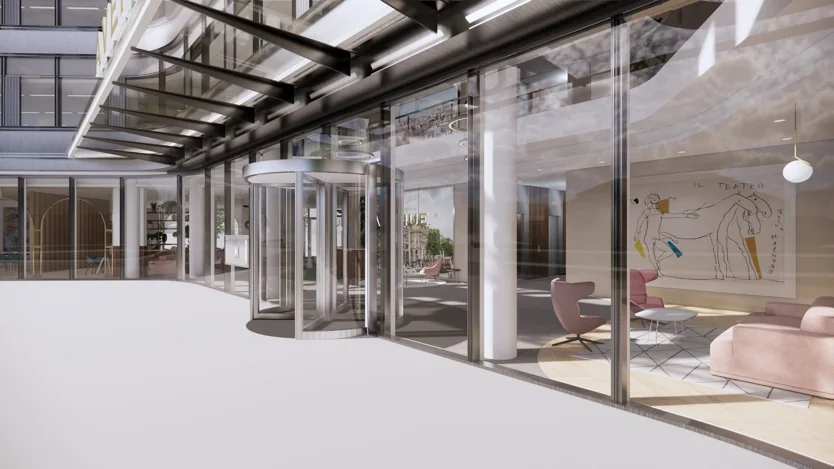 Ingang van een modern kantoorgebouw aan de Europalaan met glazen gevel en draaideur.