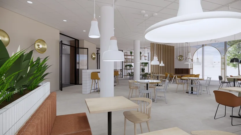 Moderne en licht ingerichte horecaruimte aan de Europalaan met houten meubels, groene planten en grote hanglampen.
