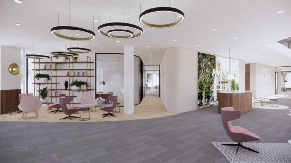 Moderne en stijlvol ingerichte lobby van kantoorgebouw Europalaan Avenue met zithoeken, hanglampen en een ontvangstbalie.