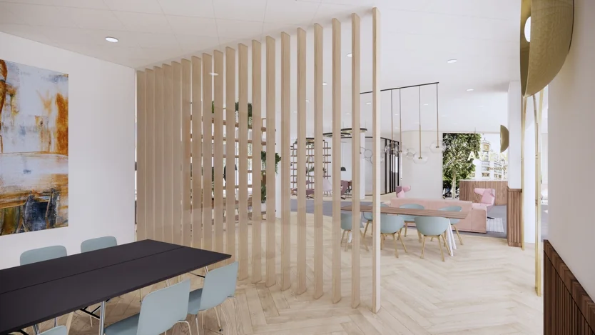 Moderne en lichte kantoorruimte aan de Europalaan met houten lamellenwand en pastelkleuren in het interieur.