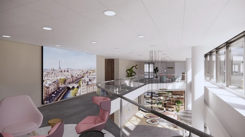 Moderne kantoorruimte aan de Europalaan met zitgedeelte, grote wandfoto van Parijs en veel natuurlijk licht.