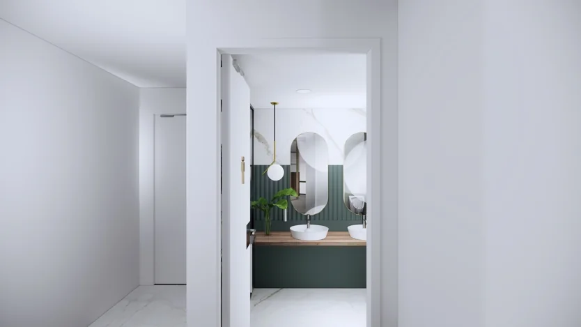 Modern ingerichte badkamer met donkergroene wastafelmeubels, dubbele waskommen en ovale spiegels.