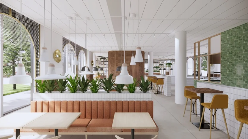 Modern en licht interieur van een restaurant aan de Europalaan met oranje zitbanken, groene planten en witte hanglampen.