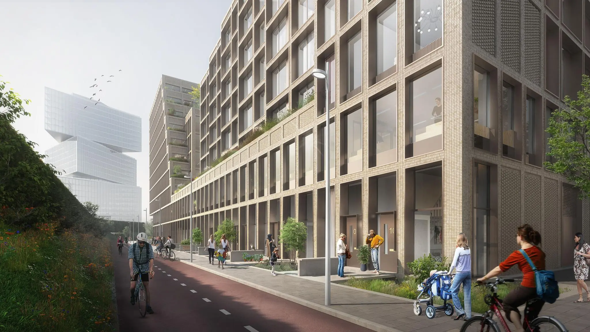 Moderne woongebouwen aan de Gelrestraat met fietsers en voetgangers op een zonnige dag.