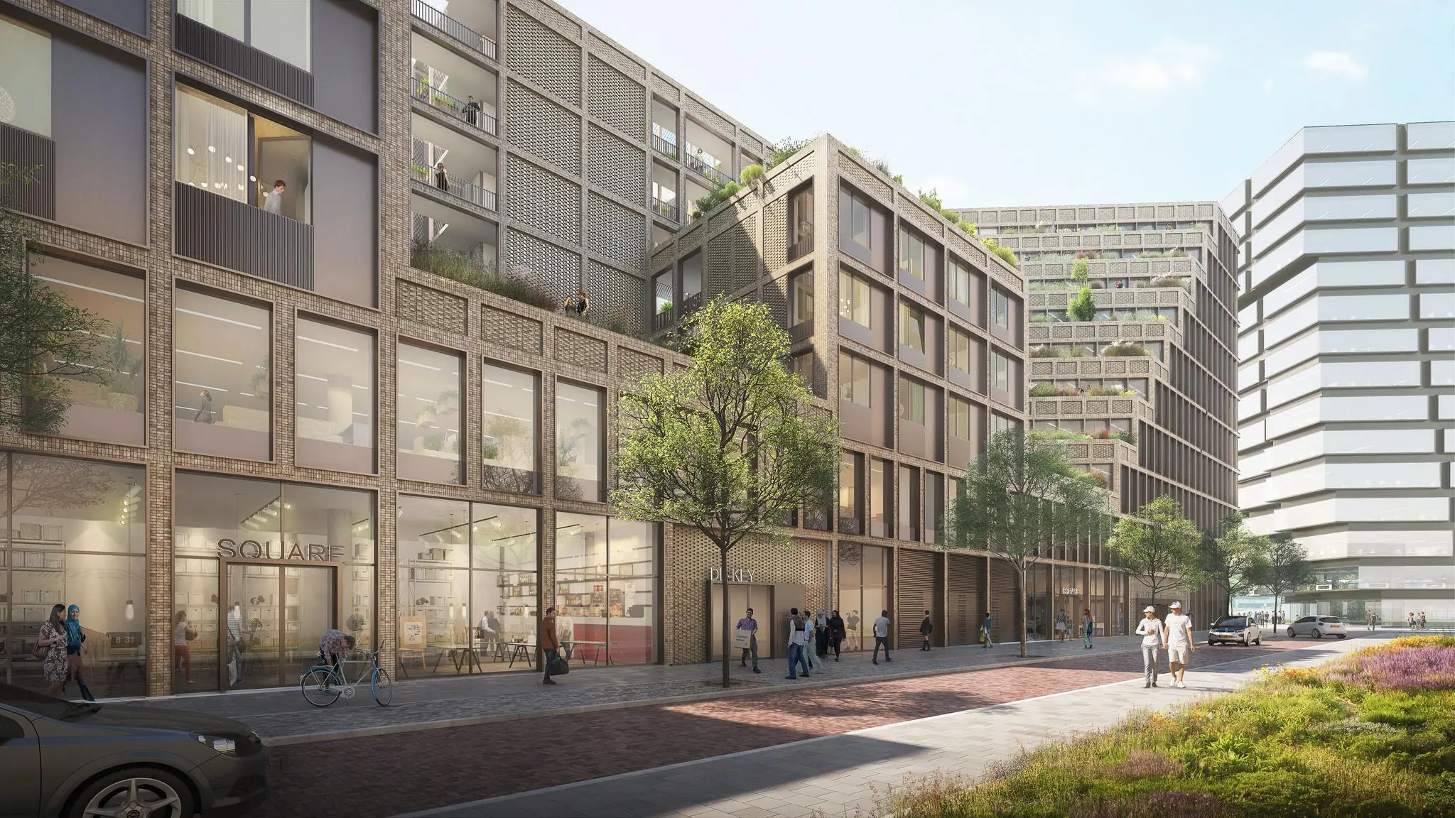 Moderne nieuwbouw aan de Gelrestraat met winkels op de begane grond en woonlagen erboven.