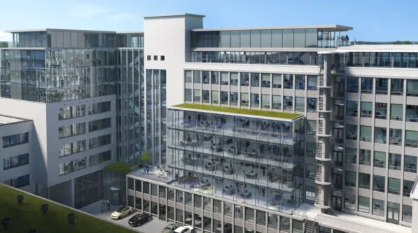 Moderne kantoorgebouwen aan de Catharijnesingel met grote glazen gevels en dakterrassen.