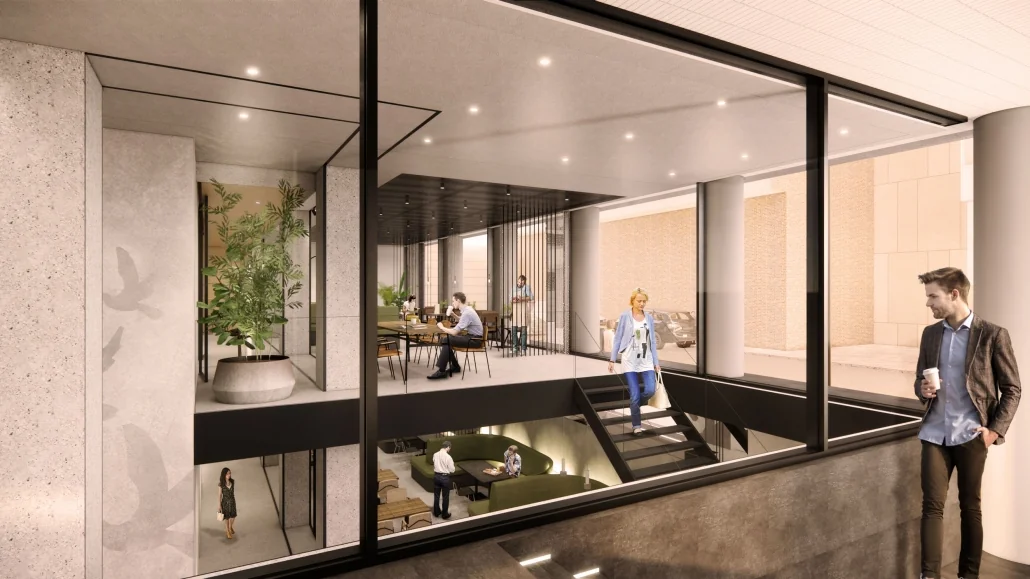 Moderne kantoorruimte aan de Catharijnesingel met glazen wanden, open werkplekken en een trap tussen twee verdiepingen.