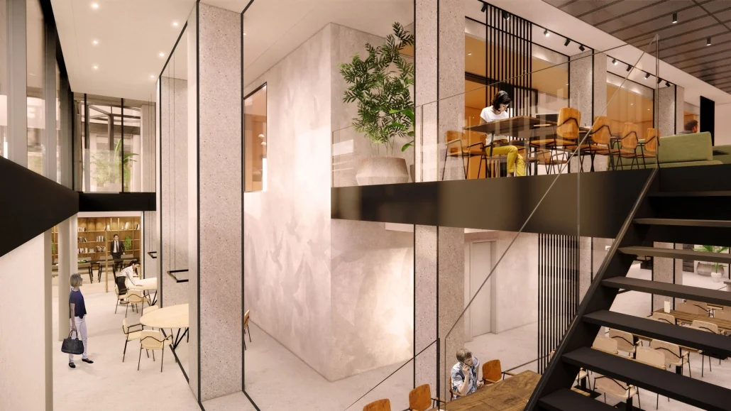 Moderne, open kantoorruimte aan de Catharijnesingel met meerdere werkplekken, een trap en glazen wanden.