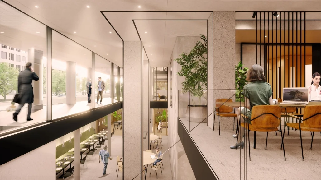 Modern kantoorinterieur aan de Catharijnesingel met open werkplekken, glazen wanden en uitzicht op een loopbrug.