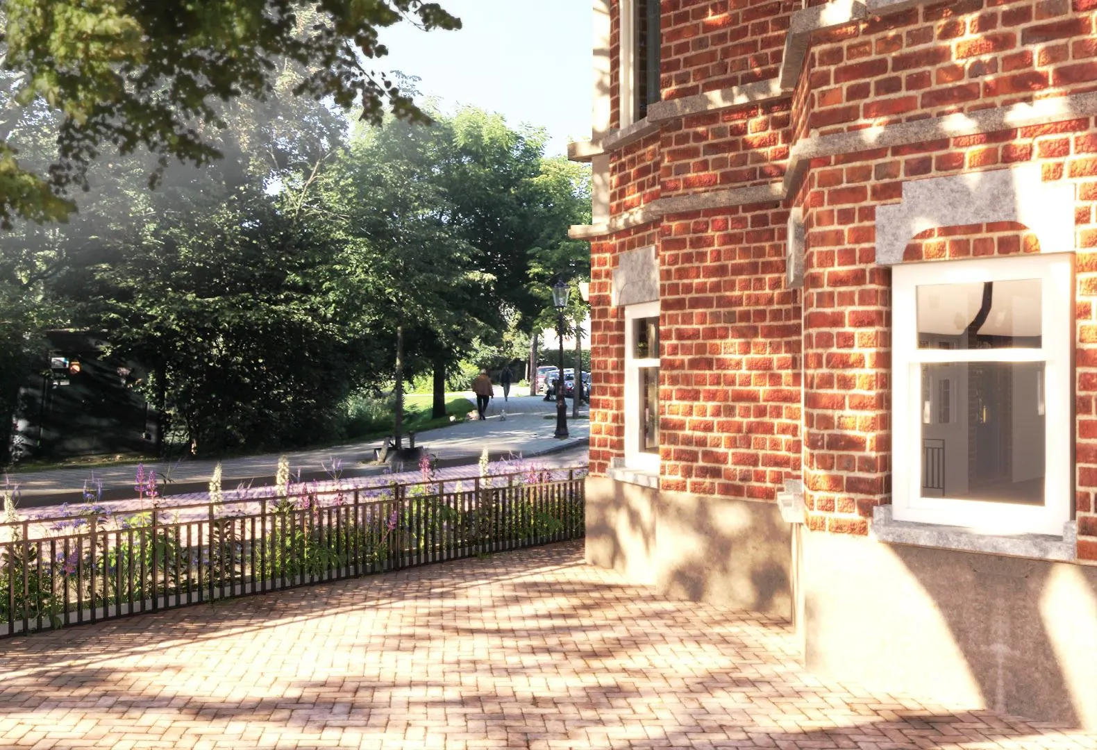 Zonnige straat met rode bakstenen gevel aan de Koningslaan en uitzicht op een groen park met wandelaars.