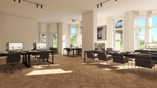 Licht en ruim kantoor aan de Koningslaan met moderne werkplekken en grote ramen.