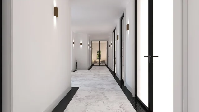 Moderne, strak afgewerkte gang met marmeren vloer en glazen deuren in een pand aan de Koningslaan.