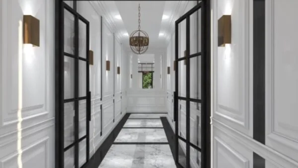 Luxe witte gang met marmeren vloer, zwarte stalen deuren en moderne wandverlichting aan de Koningslaan.