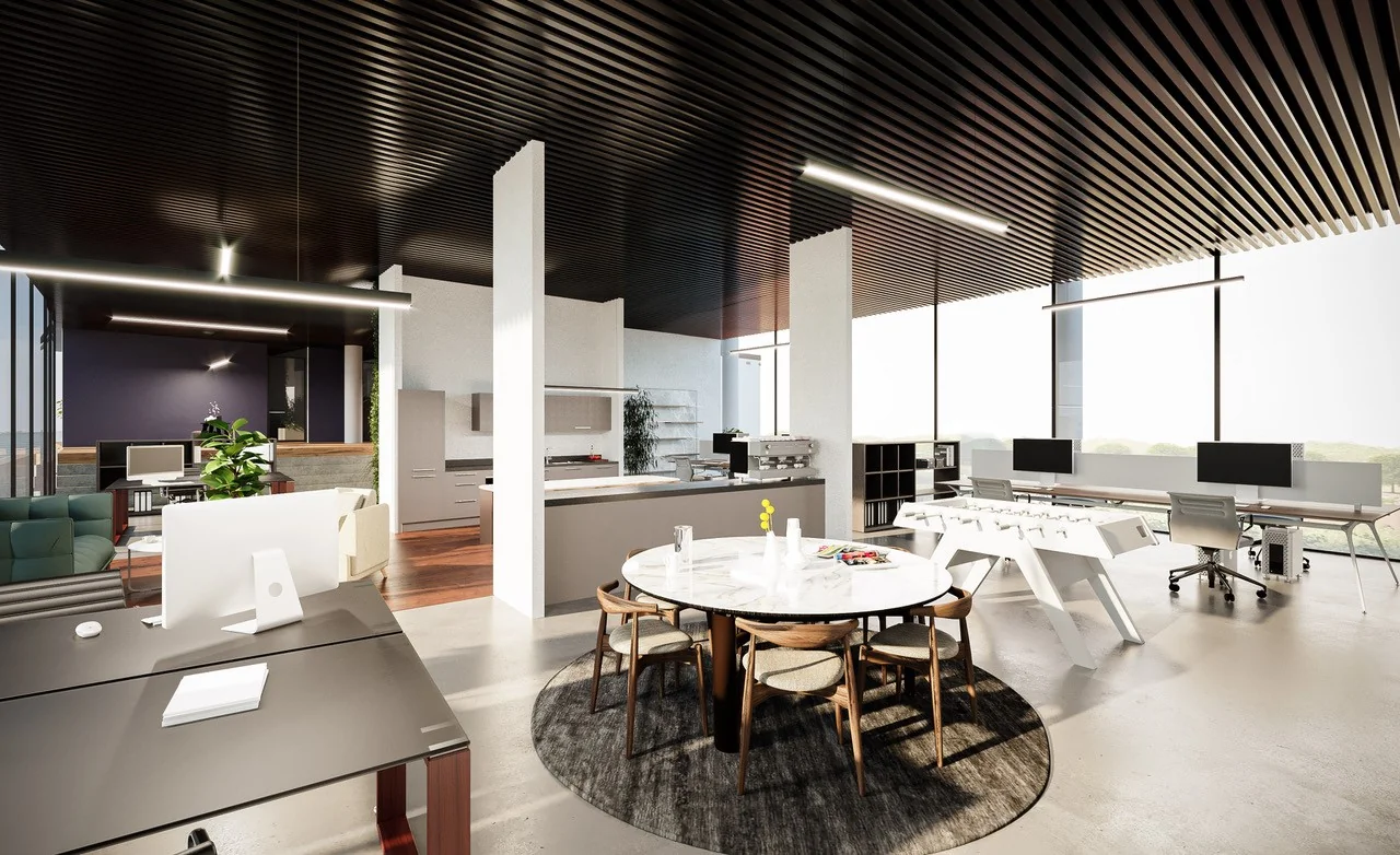 Modern en licht open kantoor met werkplekken, zithoek, ronde vergadertafel en geïntegreerde keuken.