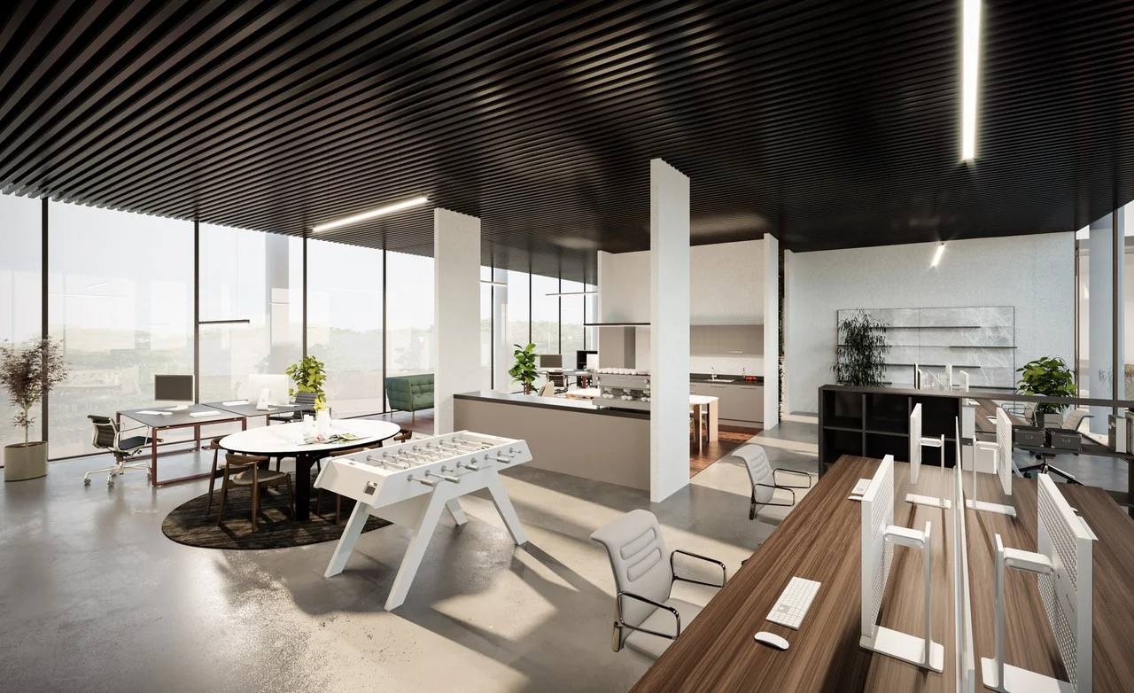 Moderne open kantoorruimte met werkplekken, vergadertafel, keuken en een wit tafelvoetbalspel.