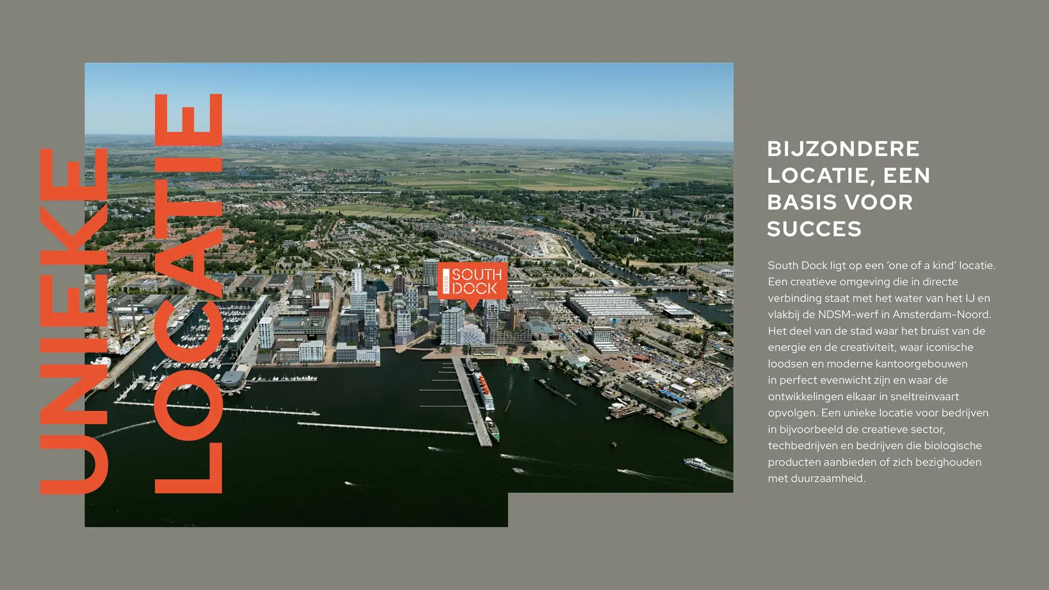 Luchtfoto van de NDSM-pier in Amsterdam-Noord met aanduiding van het South Dock bedrijventerrein langs het IJ.