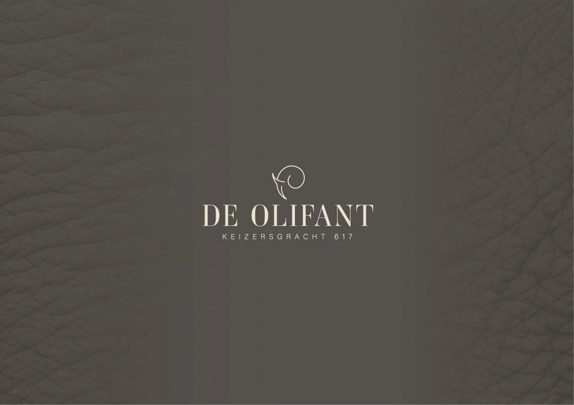 Logo van De Olifant op een donkere leren achtergrond met het adres Keizersgracht 617.