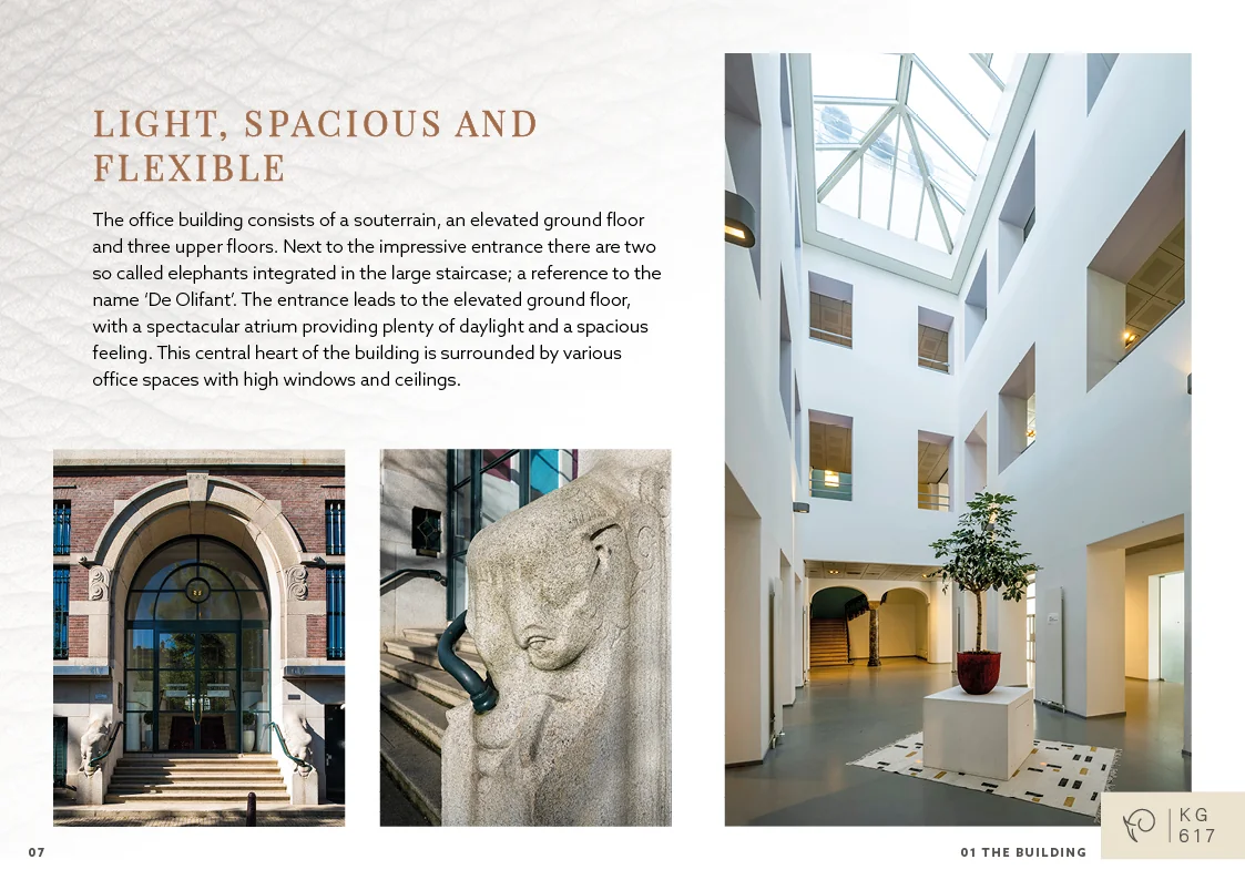 Modern kantoorgebouw aan de Keizersgracht met een glazen atrium, hoge plafonds en stenen olifantendecoratie bij de entree.