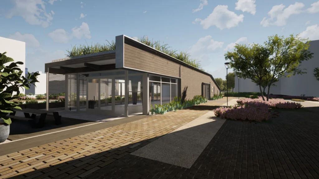 Een modern, duurzaam gebouw genaamd Scorpius met groendak en grote ramen, omgeven door een tuin met bomen en bloemen.