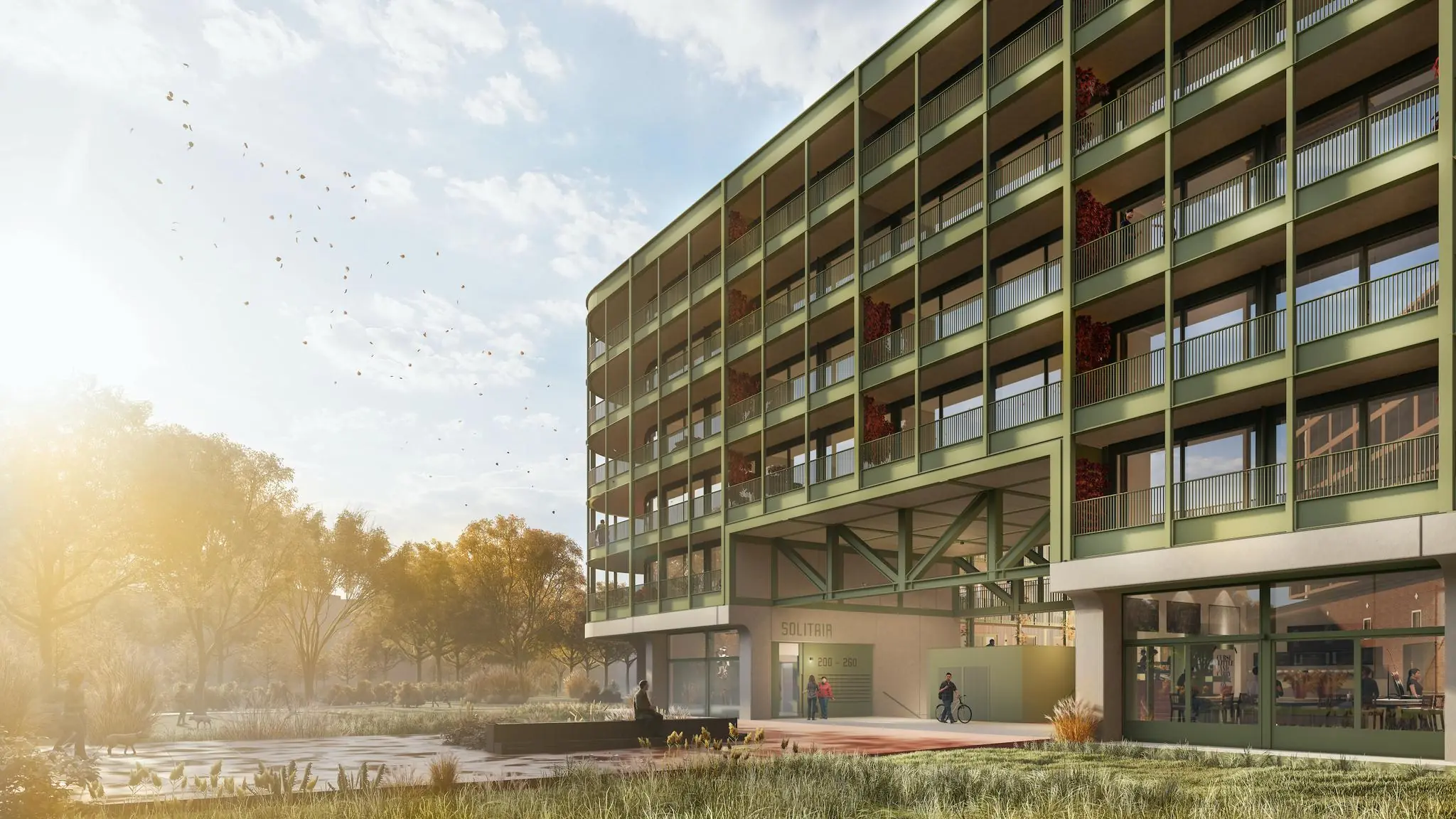 Moderne groene woontoren aan de Cartesiusweg met balkonverdiepingen en omliggende parkachtige omgeving.