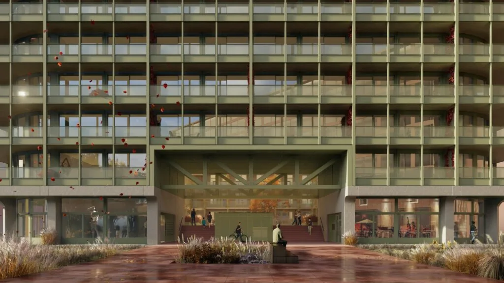 Vooraanzicht van een modern appartementencomplex aan de Cartesiusweg met balkons, glazen gevel en een doorgang naar de binnenplaats.