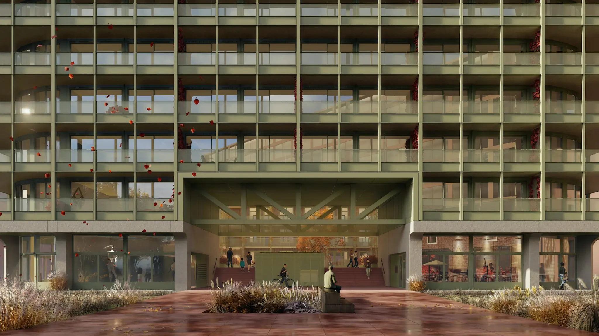 Vooraanzicht van een modern appartementencomplex aan de Cartesiusweg met balkons, glazen gevel en een doorgang naar de binnenplaats.