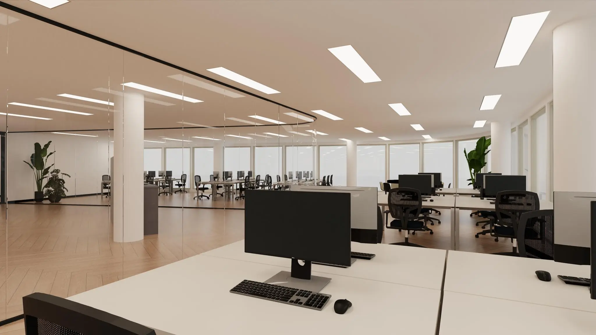 Moderne, ruime kantoortuin aan de Europalaan met werkplekken, computers en glazen wanden.