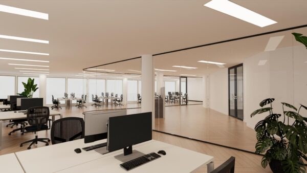 Moderne, open kantooruimte aan de Europalaan met glazen wanden, werkplekken en veel natuurlijk licht.