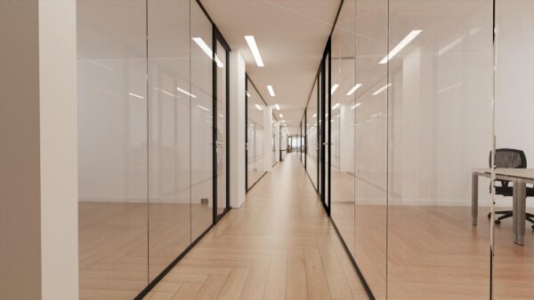 Lange, moderne kantoorhal aan de Europalaan met glazen wanden en houten vloer.