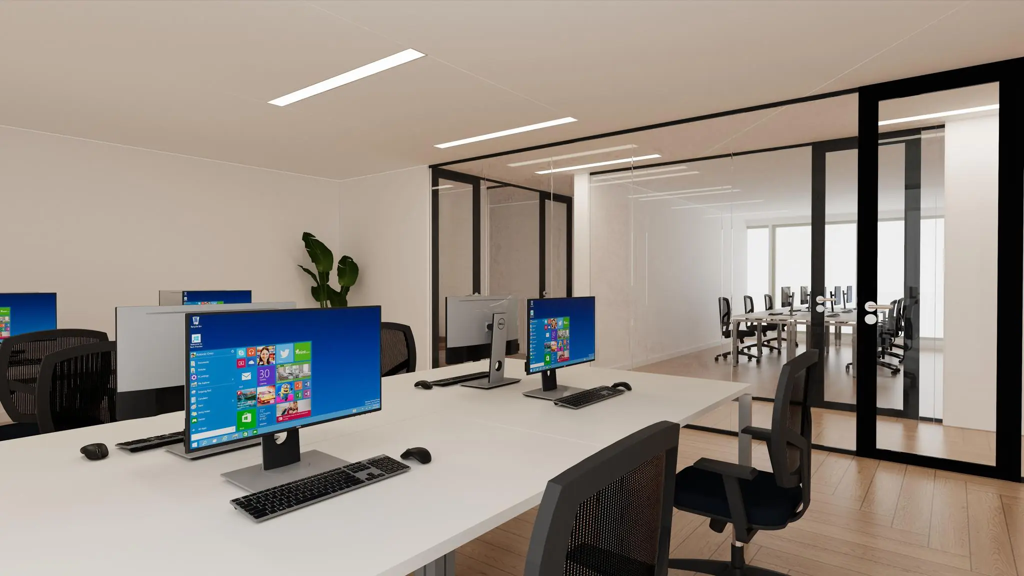 Moderne kantooruimte aan de Europalaan met werkplekken voorzien van computers en een vergaderruimte achter glazen wanden.