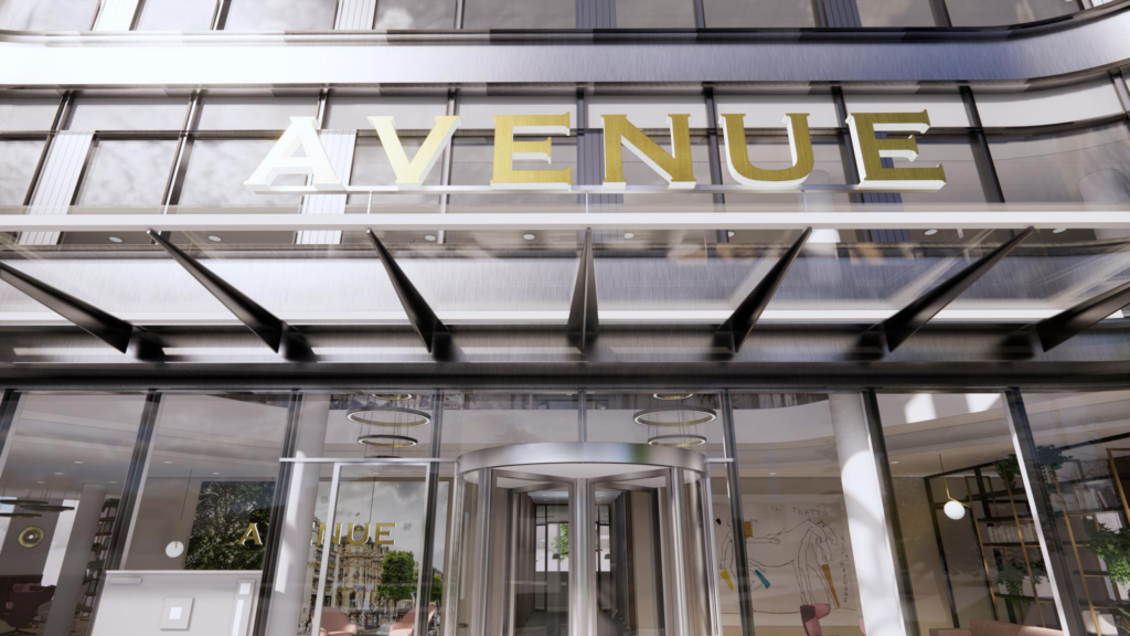 Ingang van het gebouw 'Avenue' aan de Europalaan met glazen deuren en een moderne gevel.