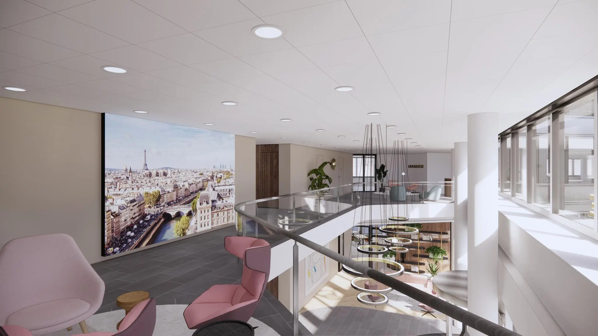 Moderne kantoorlounge aan de Europalaan met zithoeken, planten en een grote wandafbeelding van Parijs.