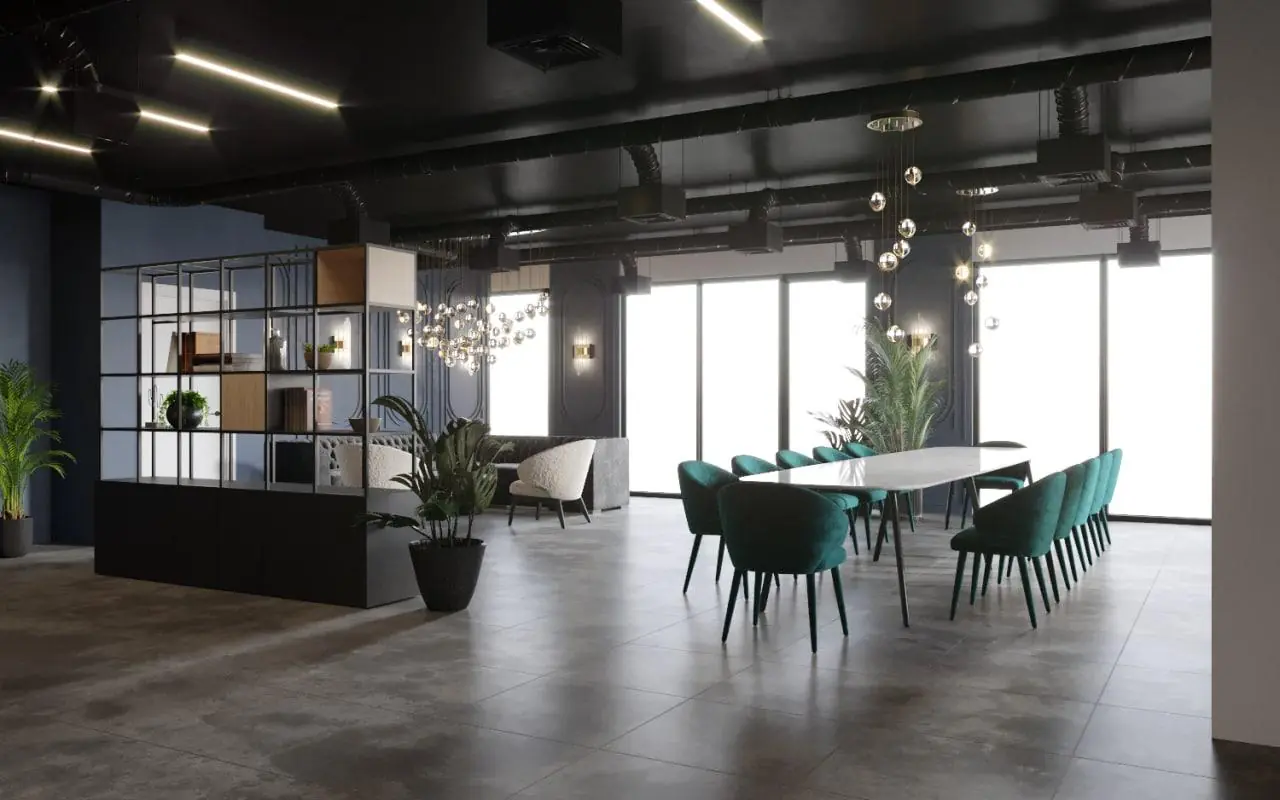 Moderne vergaderruimte aan de Grasweg met een lange tafel, groene stoelen, plafondverlichting en grote ramen.