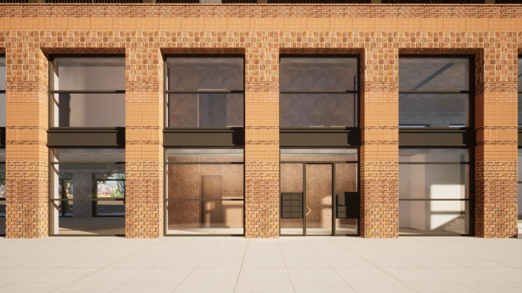 Vooraanzicht van de bakstenen gevel en entree van een modern gebouw aan de Papaverweg.