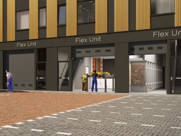 Façade van Flex Units aan de Treubstraat met werkende monteurs en open garagedeuren.