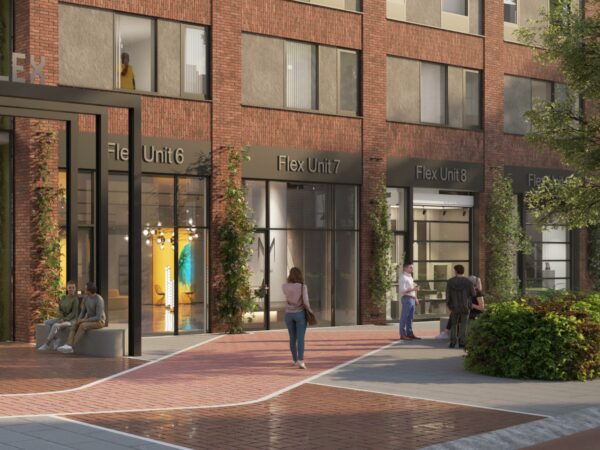 Straatbeeld van de Treubstraat met mensen voor een modern bedrijfsverzamelgebouw met Flex Units 6, 7 en 8.