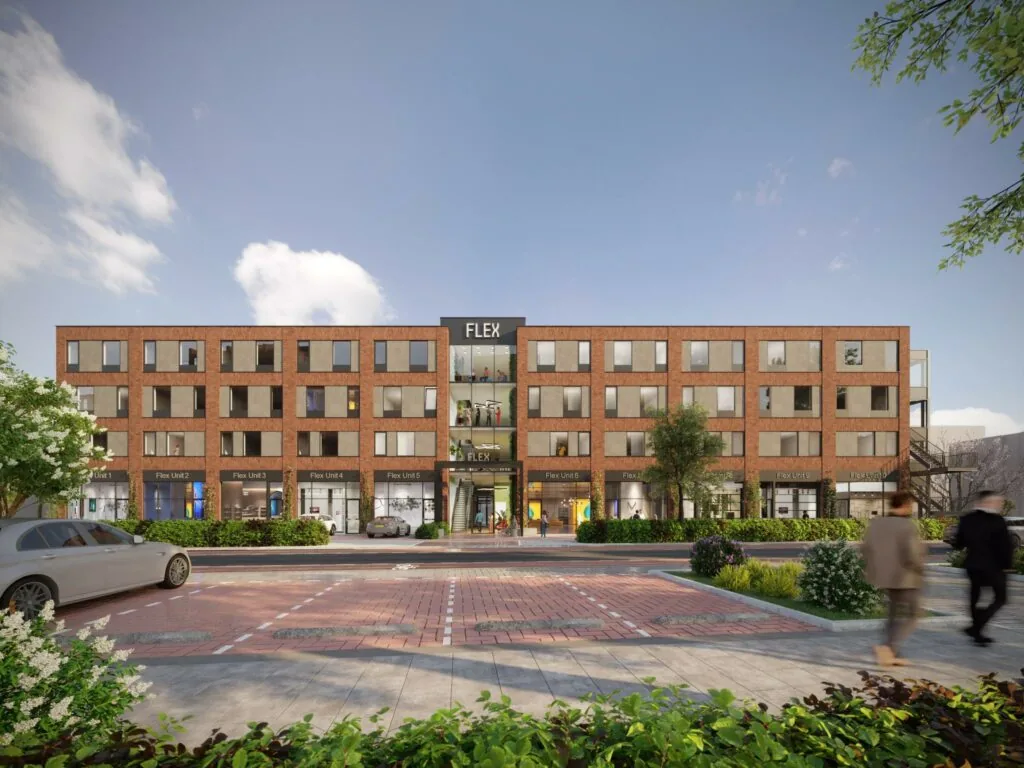 Straatbeeld van het moderne bedrijfsverzamelgebouw FLEX aan de Treubstraat met meerdere flex units en een bakstenen gevel.