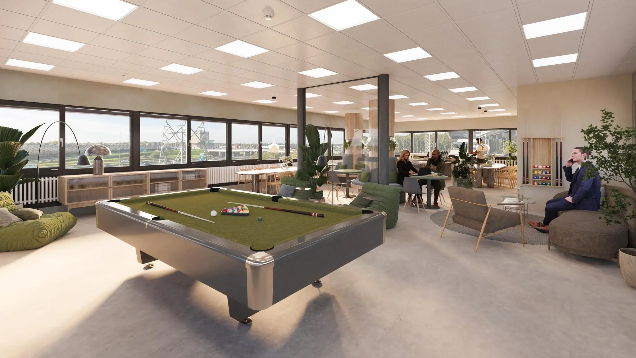 Moderne, open kantoorruimte aan de Zonnebaan met een pooltafel, loungehoek en werkplekken.