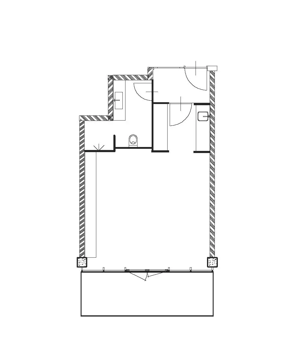 Plattegrond van een appartement aan de Danzigerkade met badkamer, toilet, keuken en woonkamer met balkon.