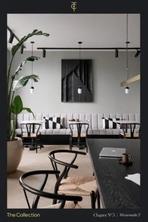 Stijlvol ingericht interieur van Westermarkt 2 met moderne meubels, een grote plant en minimalistische verlichting.