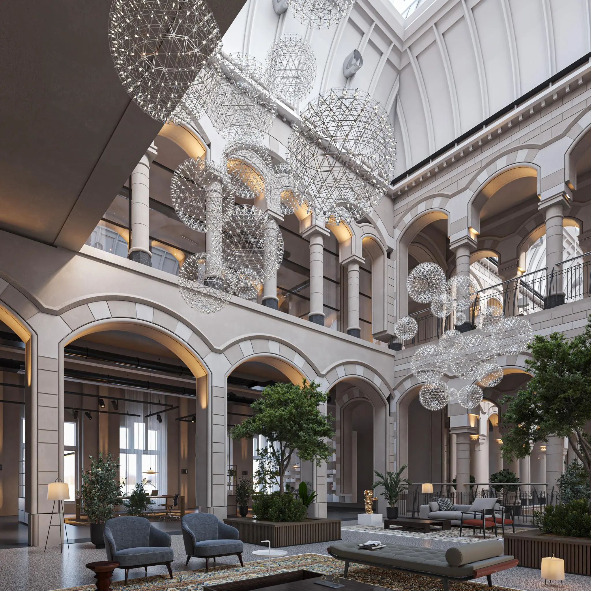 Luxe, modern ingerichte binnentuin met hoge plafonds en glazen koepel in een historisch pand aan de Nieuwezijds Voorburgwal.