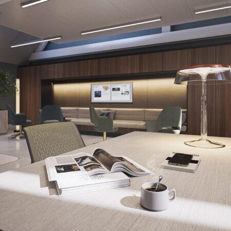 Moderne wachtruimte aan de Nieuwezijds Voorburgwal met een stijlvolle inrichting en een open tijdschrift op tafel.