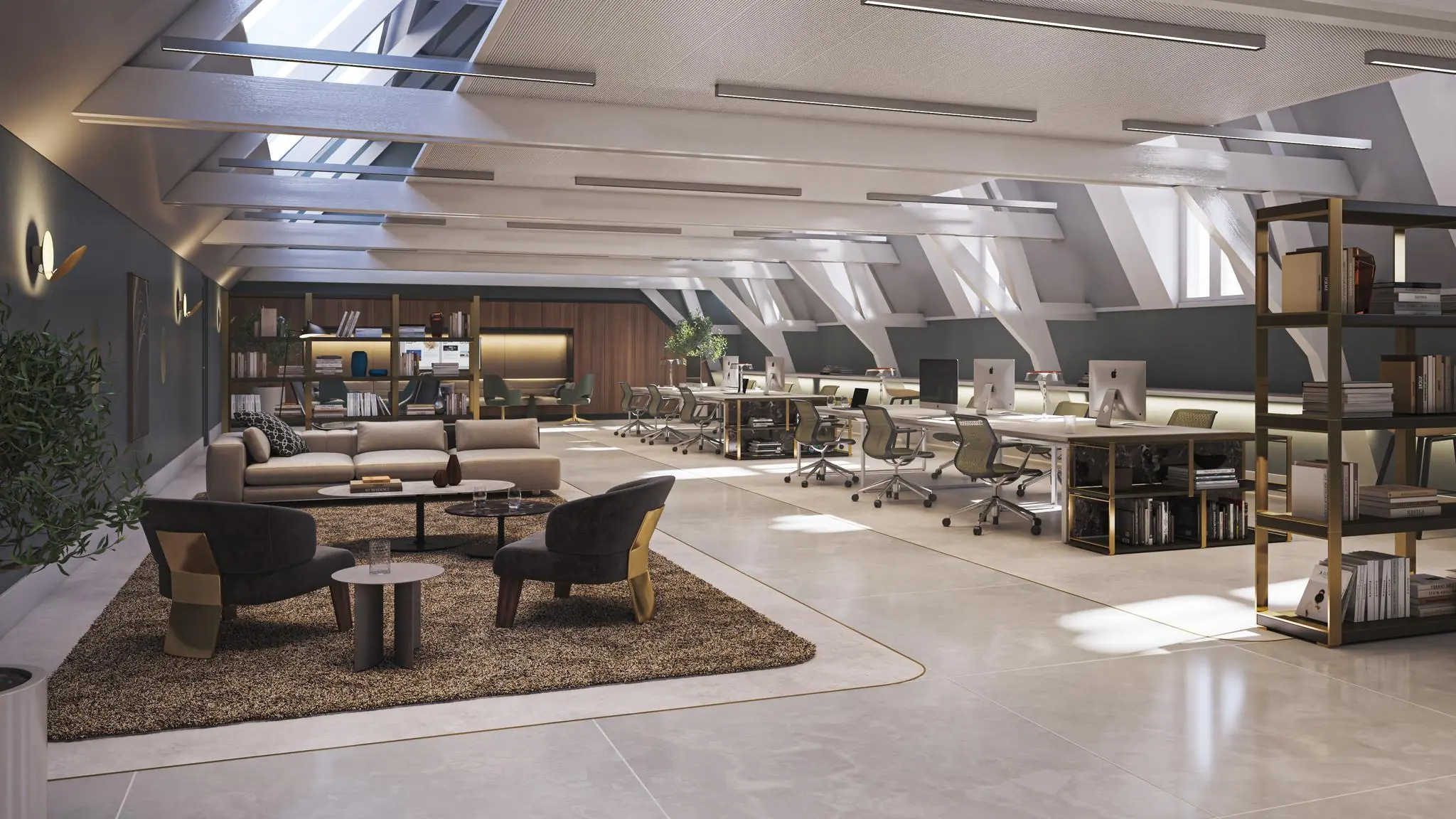 Modern ingericht kantoor op de Nieuwezijds Voorburgwal met open werkplekken, loungehoek en veel daglicht via dakramen.