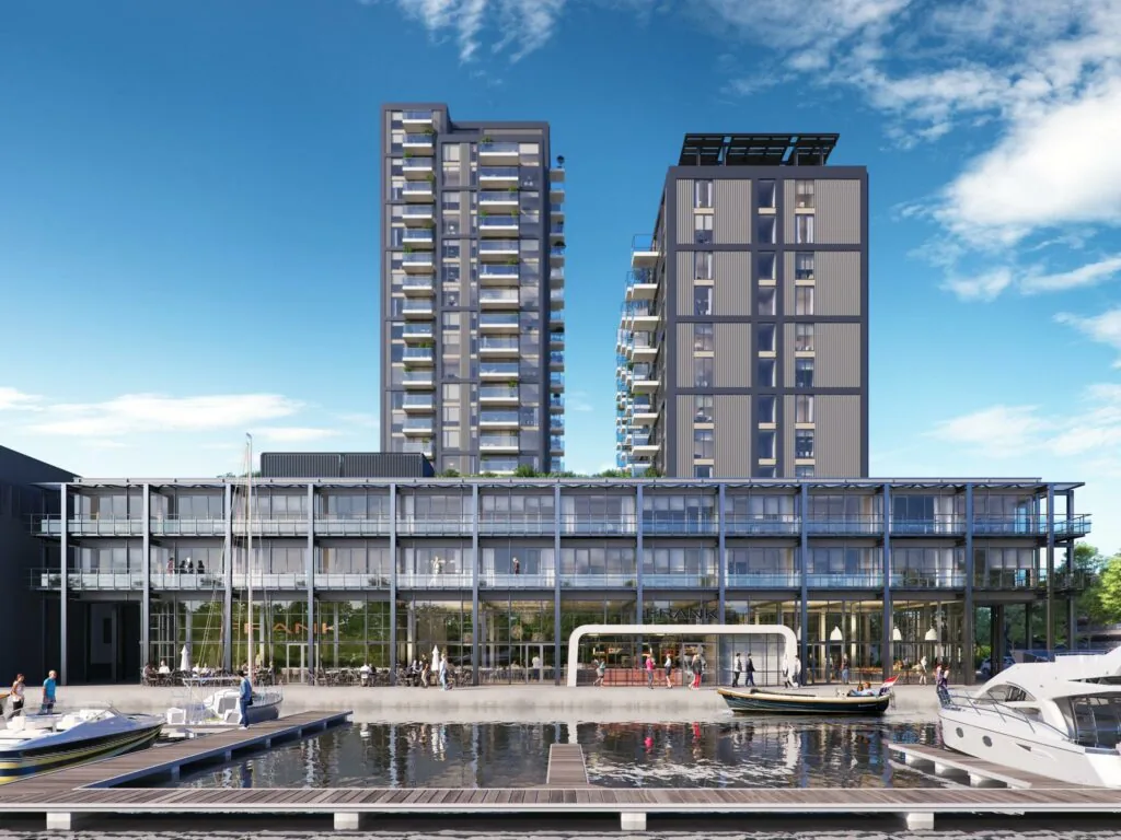 Modern appartementencomplex aan de Melkwegstraat met jachthaven op de voorgrond.