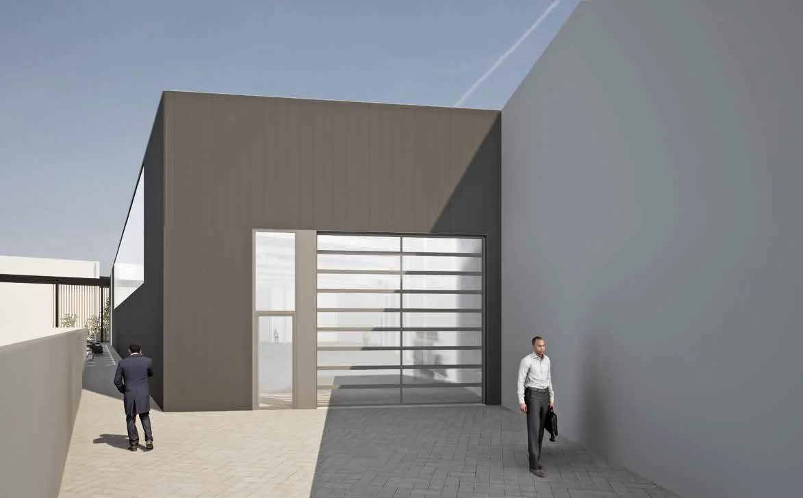 Moderne bedrijfsunit aan de Strickledeweg met glazen roldeur en twee zakelijke personen op de voorgrond.