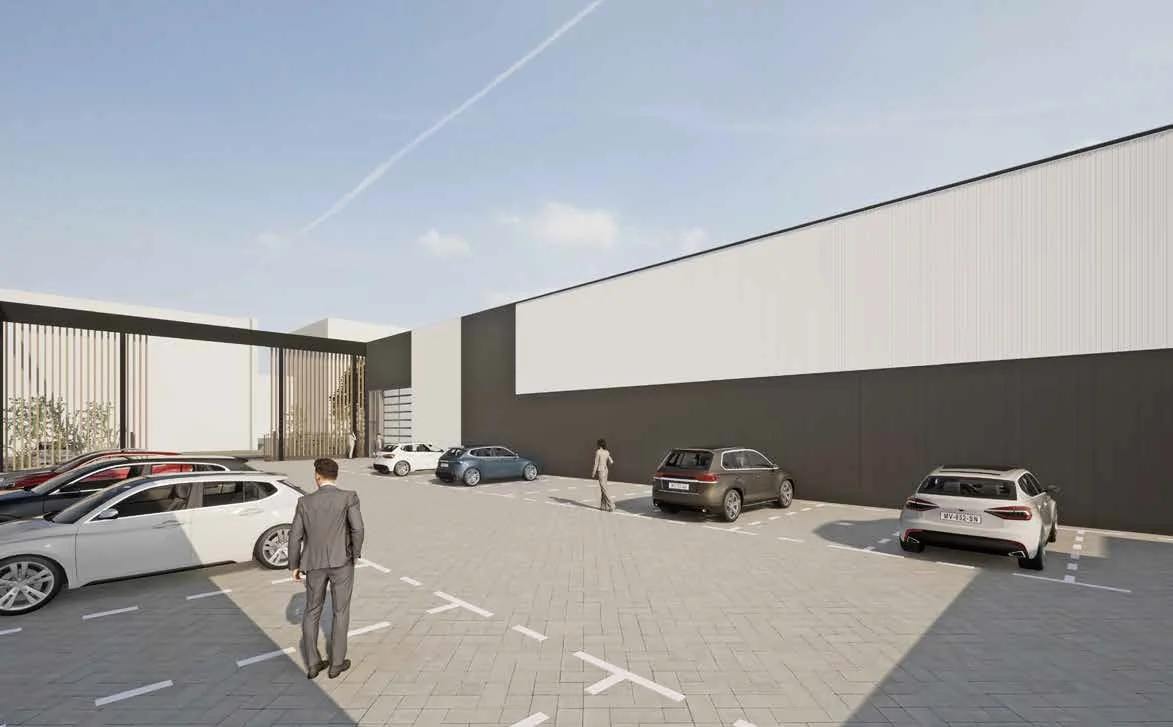 Moderne parkeerplaats met geparkeerde auto's en zakenmensen bij een bedrijfsgebouw aan de Strickledeweg.