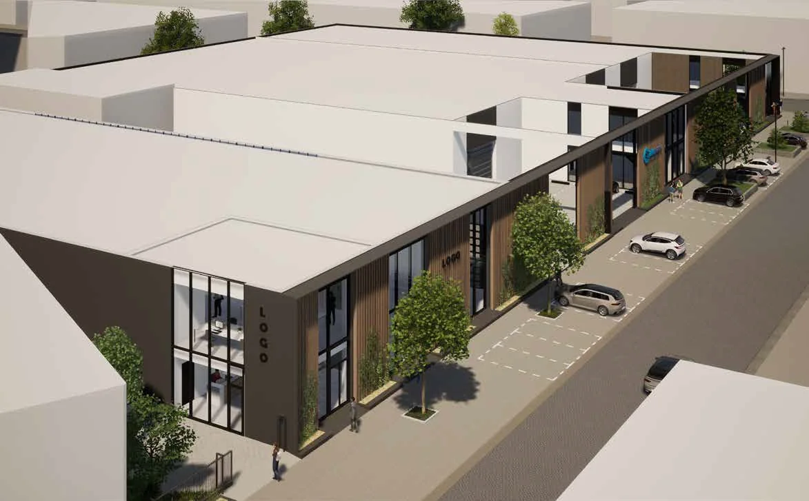 Moderne bedrijfsunits aan de Strickledeweg met parkeerplaatsen en groene gevelaccenten.