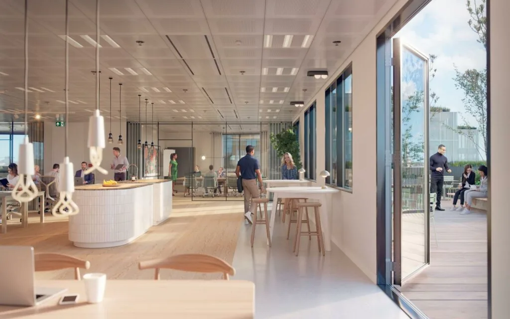 Moderne kantoorruimte aan de Basisweg met open werkplekken, vergaderruimtes en een buitenterras.