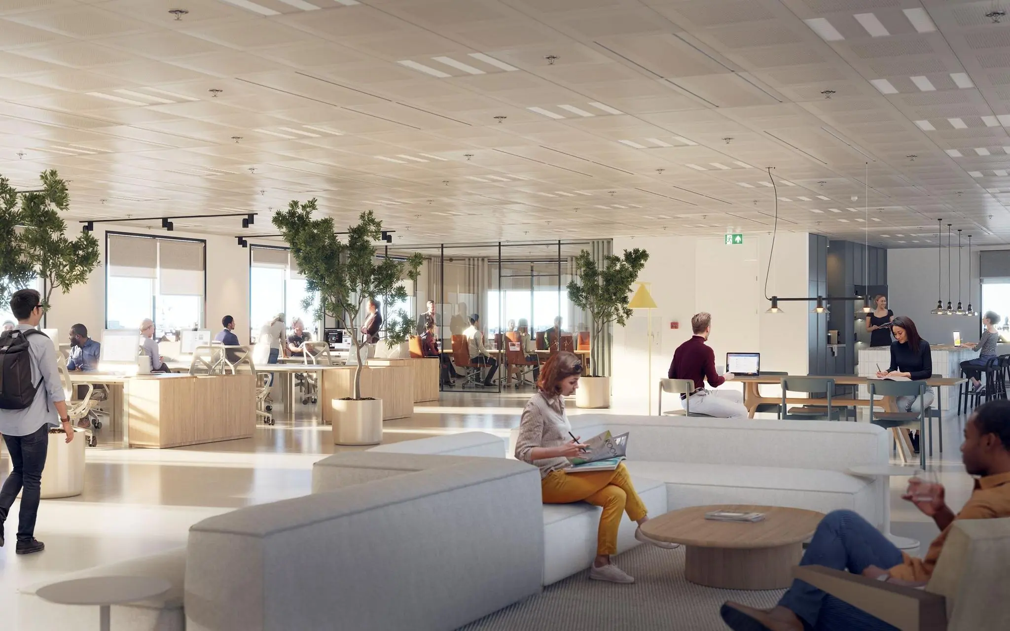 Moderne, open kantoorruimte aan de Basisweg met werkplekken, vergaderruimtes en een loungegedeelte.