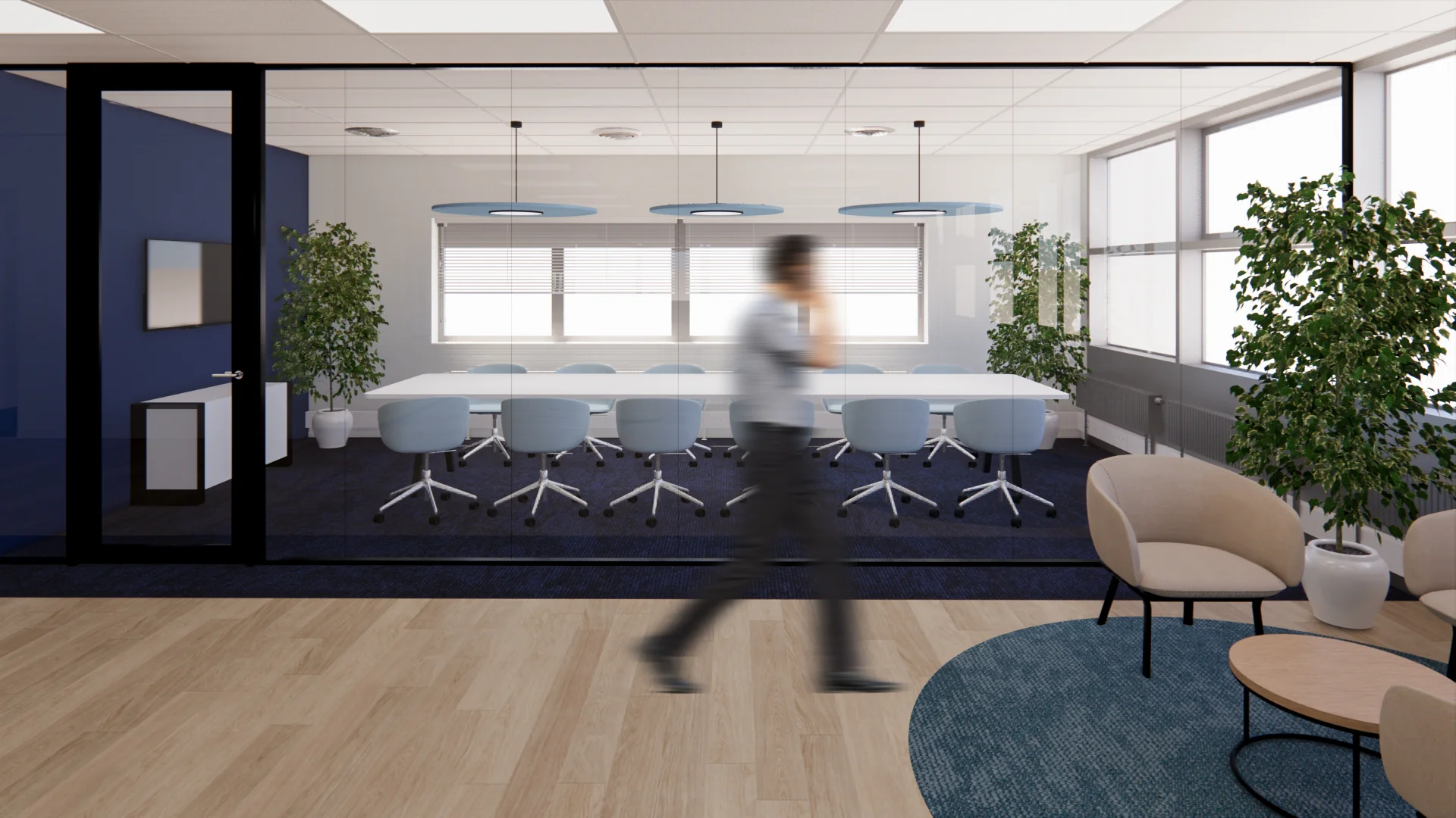 Moderne vergaderruimte aan de Kleveringweg met glazen wanden, lichtblauwe stoelen en een persoon die voorbij loopt.